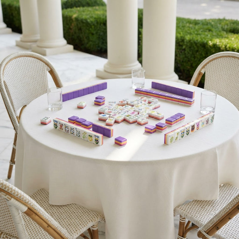 Amalfi Lemon mahjong tiles set up on a terrace table