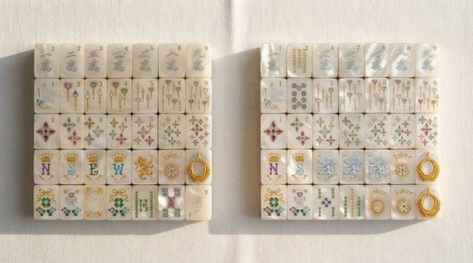 Four women play mahjong at a country club card table, extra tiles set aside beside racks and a mat