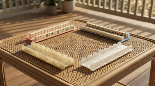 Racks with integrated pushers sliding across a mahjong table on a summer screened porch