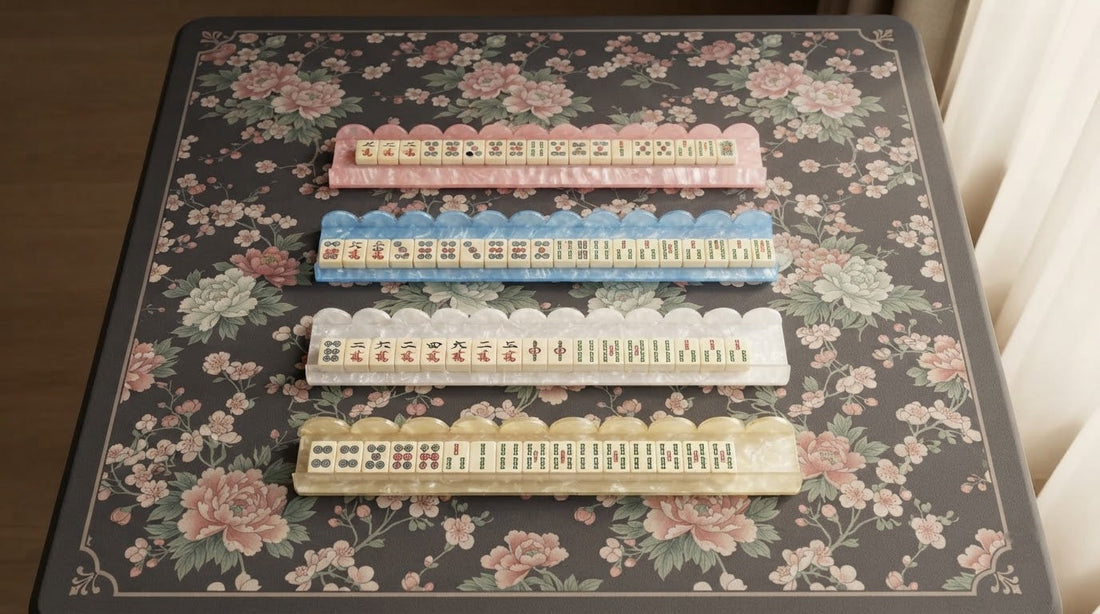 Four women sliding tiles along clear acrylic racks with built-in pushers in a community room