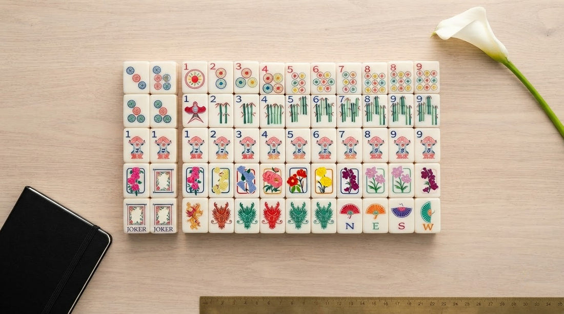 Four women in a modern activity room admiring a contemporary-styled set of mahjong tiles