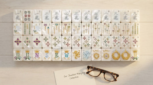 Four women around a sunroom mahjong table, one holding up the printed hand card