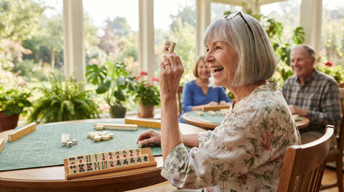 Four women in a greenhouse room celebrating as one raises her self-drawn winning tile