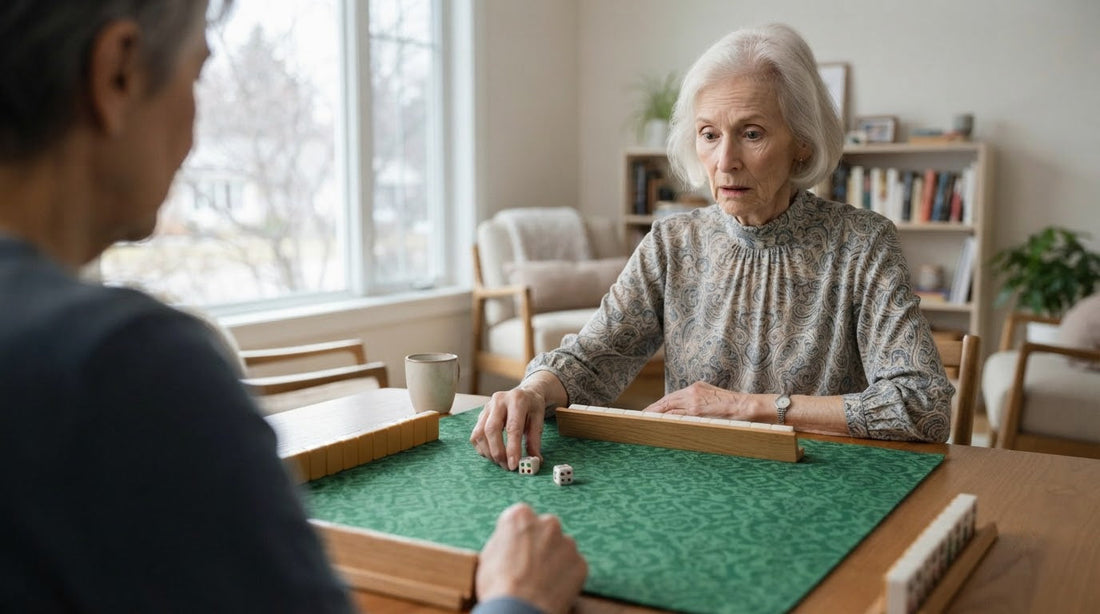 On a screened porch, a player reaches to claim the dealer's first discard as her tablemates react.