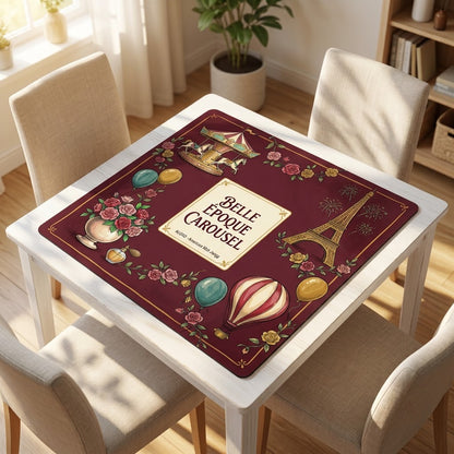 Belle Époque Fairground mahjong mat on a card table with four chairs in a living room