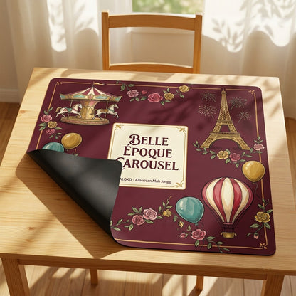 Belle Époque Fairground mahjong mat with one corner folded back to show the black rubber underside