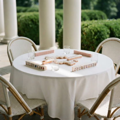 Blush Garden mahjong tiles set up on a terrace table
