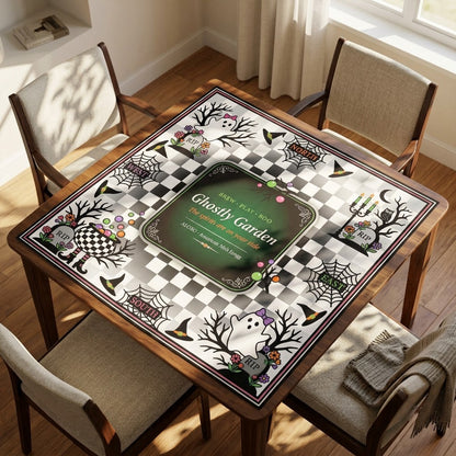 Checkerboard Ghost Garden mahjong mat on a square table with four chairs