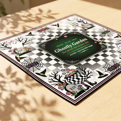 Checkerboard Ghost Garden mahjong mat lying flat on a table, seen from a low angle