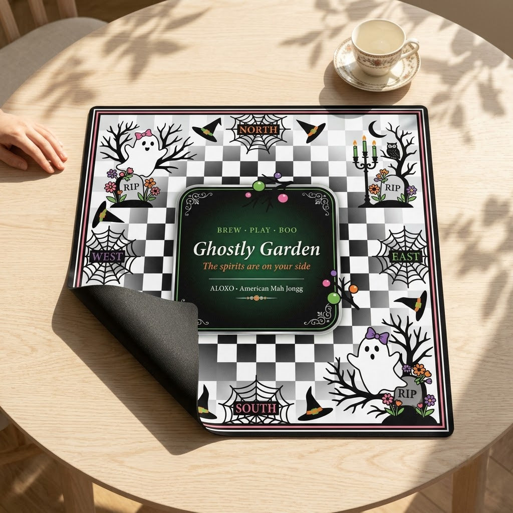 Checkerboard Ghost Garden mahjong mat with one corner folded back to show the black rubber underside