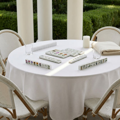Clubhouse Green mahjong tiles set up on a terrace table