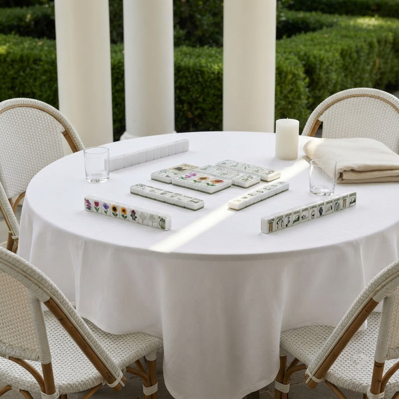 Clubhouse Green mahjong tiles set up on a terrace table