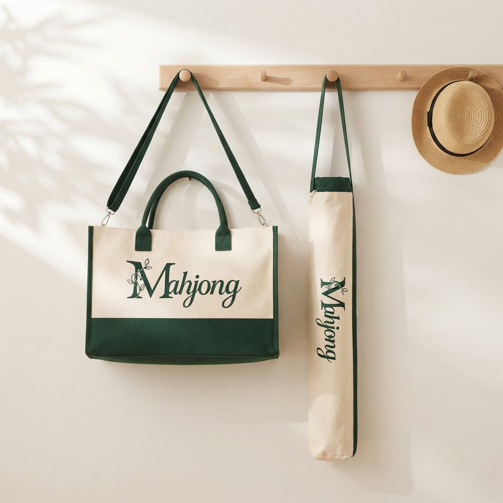 Mahjong tote and mat bag hanging from wall pegs by their straps