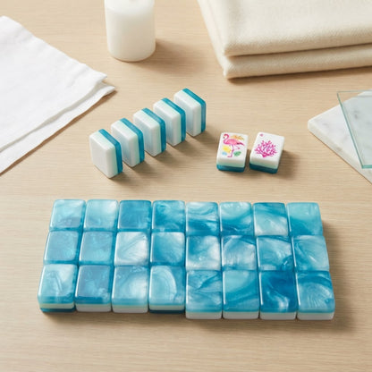 Flamingo Lagoon mahjong tiles face down showing aqua swirl backs