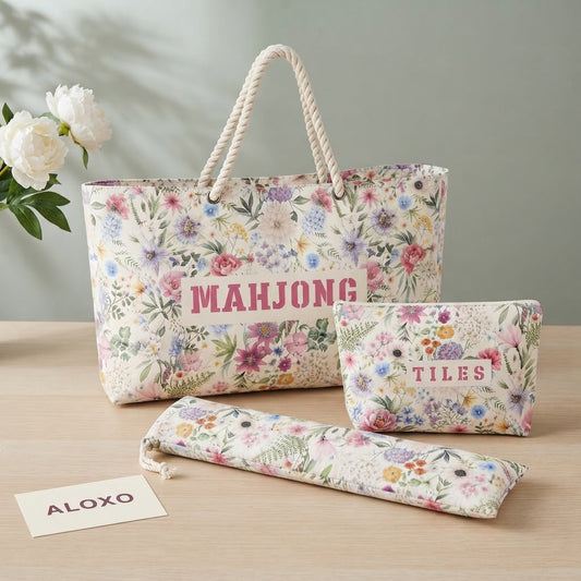 All three pieces of the floral Mahjong travel bag set: tote, TILES pouch and drawstring rack sleeve