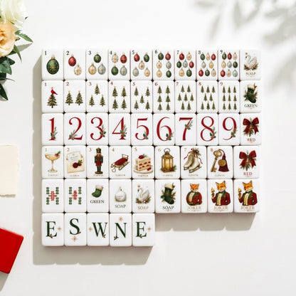 Fox & Holly Mahjong Set tiles laid out face up in rows