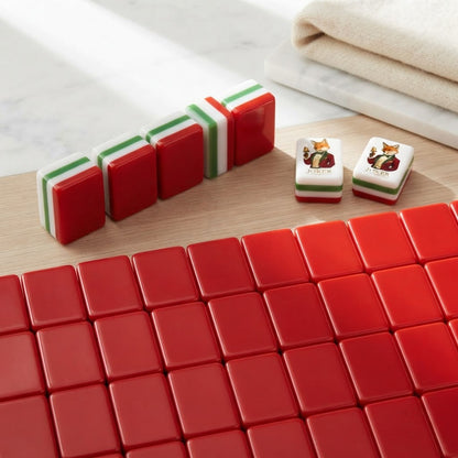 Fox & Holly mahjong tiles face down showing red backs and layered edges