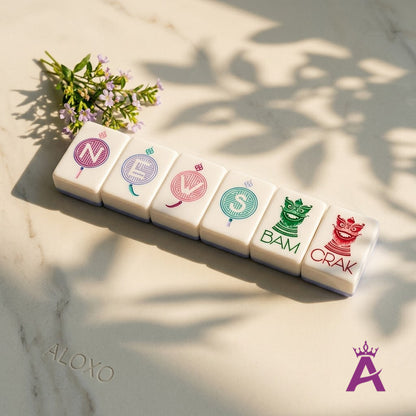 Garden Party mahjong wind and dragon honor tiles in a row