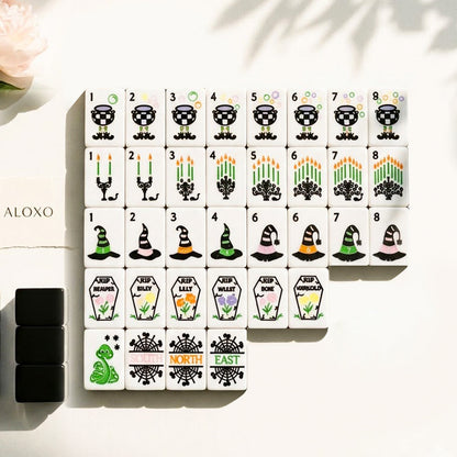 Ghostly Garden Mahjong Set — 160 line-drawn Halloween tiles laid out in a grid