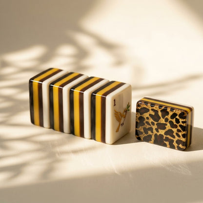 The layered edge — white, gold and deep brown running through every tile