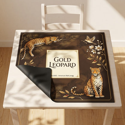 Golden Leopard Grove mahjong mat with one corner folded back to show the black rubber underside
