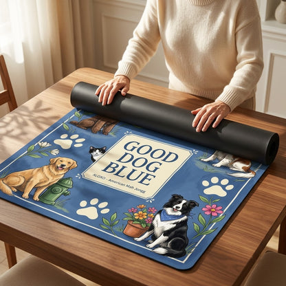 Woman unrolling the Good Dog Park mahjong mat across a card table