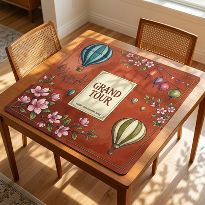 Grand Tour Balloon mahjong mat covering a square card table, angled view