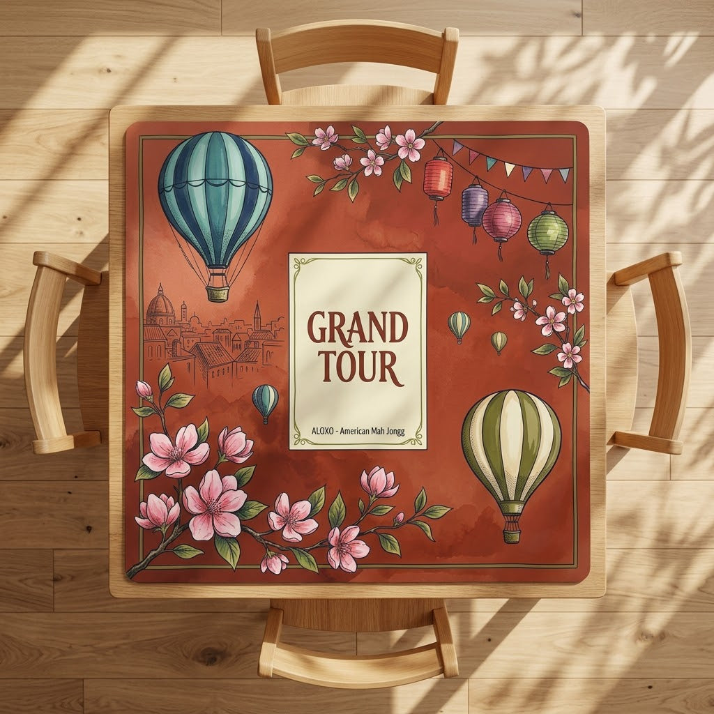 Grand Tour Balloon mahjong mat on a square card table with four chairs, seen from above