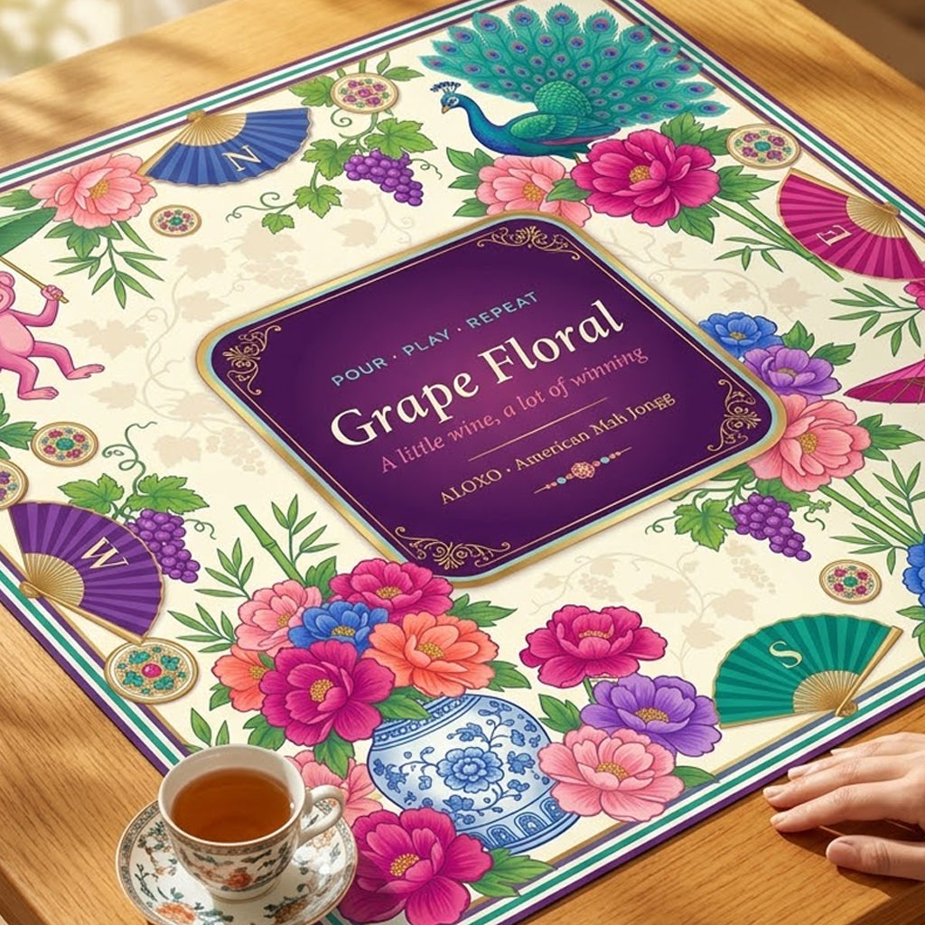 Grape & Peony Garden mahjong mat laid out on a wooden table