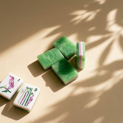 Jade-green marbled tile backs with the white, pink and green layered edge
