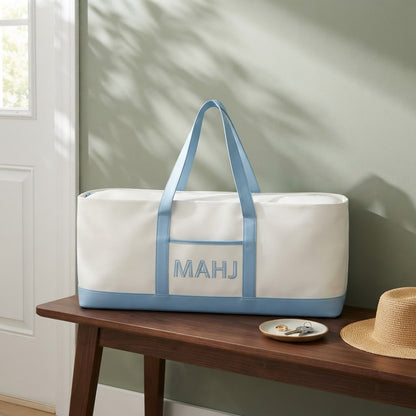 Long mahjong tote on an entry bench by the front door