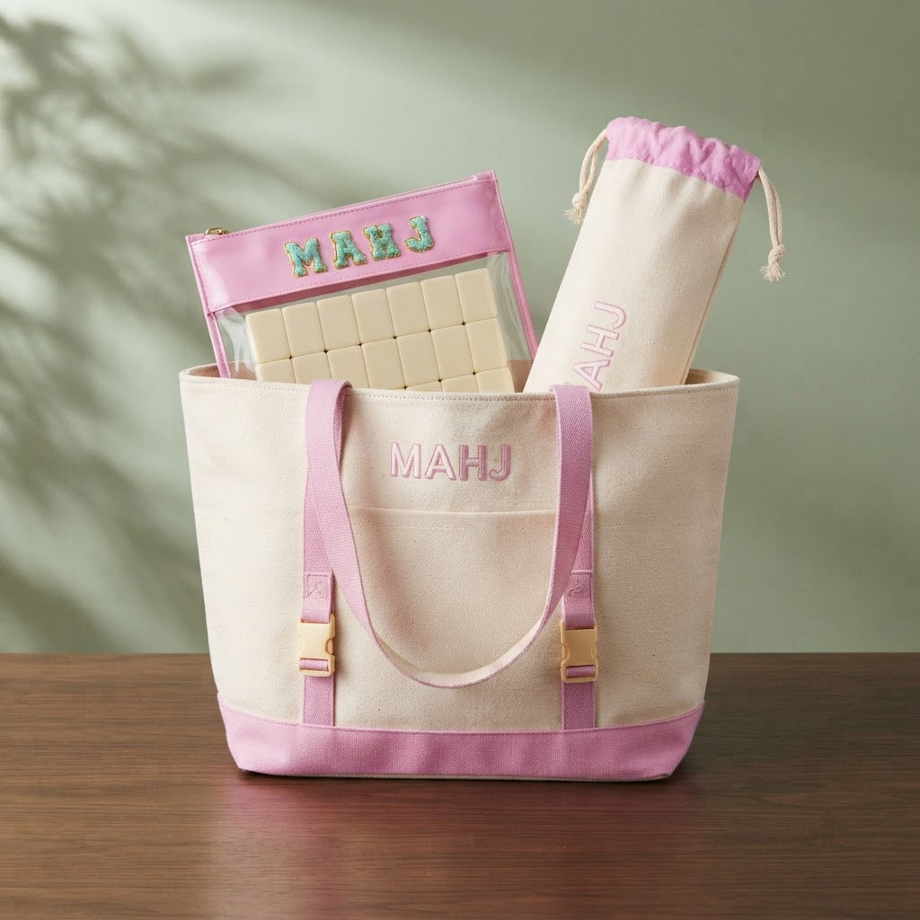 The clear tile pouch and drawstring rack bag standing inside the canvas carryall of the Mahjong Day-Bag Set