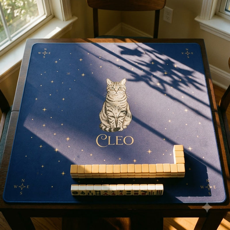 Midnight blue custom mahjong mat featuring a hand-drawn portrait of a pet cat