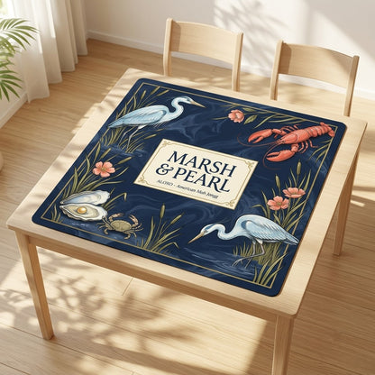 Midnight Marsh & Pearl mahjong mat covering a square card table, angled view