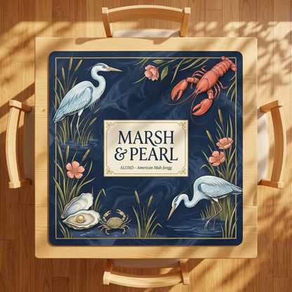 Midnight Marsh & Pearl mahjong mat on a square card table with four chairs, seen from above