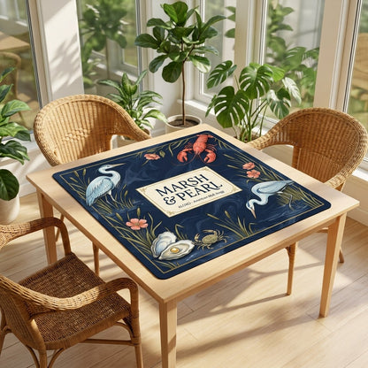 Midnight Marsh & Pearl mahjong mat on a card table in a sunroom with wicker chairs