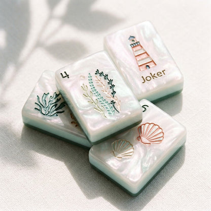 Macro of the pearl-swirled tile face — milky white with soft pink and mint iridescence shifting under the light