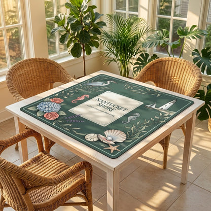 Nantucket Lighthouse Shore mahjong mat on a card table in a sunroom with wicker chairs