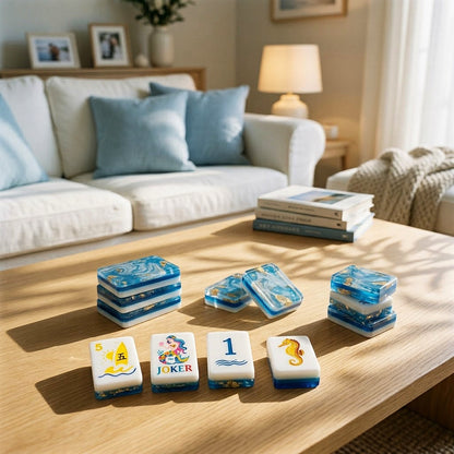 Mahjong tiles laid out on a coffee table in a calm coastal living room