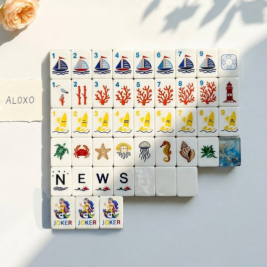 Complete Ocean Blue Mermaid American Mahjong set laid out flat, 160 tiles