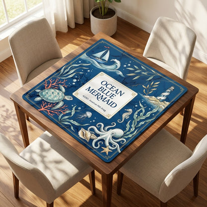 Ocean Blue Reef mahjong mat on a card table with four chairs in a living room