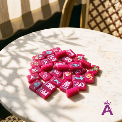 Magenta mahjong tiles on a marble bistro cafe table