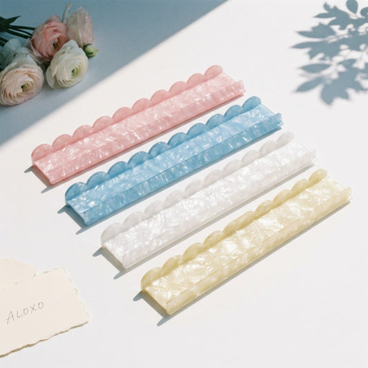 Pearl Shell mahjong racks, set of four in pink, blue, white and yellow pearlescent acrylic with scalloped edges