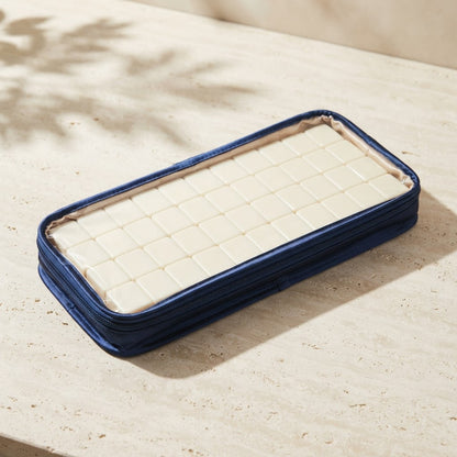 Clear-front tile pouch with mahjong tiles inside
