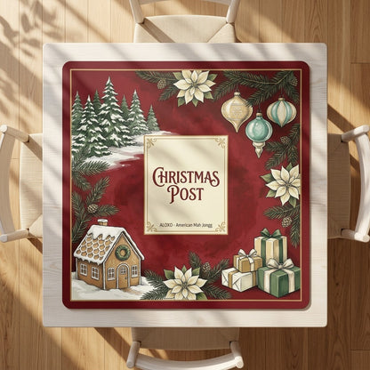 Snowy Christmas Post mahjong mat on a square card table with four chairs, seen from above