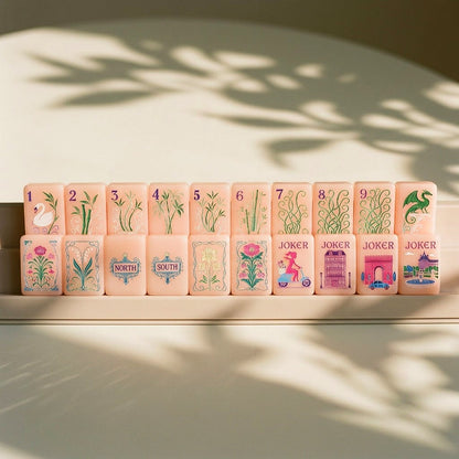 Racked line of Strawberry Paris tiles, faces easy to read across the table