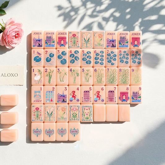 Complete Strawberry Paris American Mahjong set laid out flat, 160 pink tiles