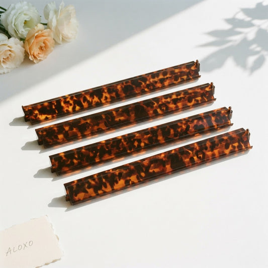 Tortoise Shell mahjong racks, set of four in amber-and-brown tortoise-pattern acrylic