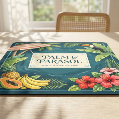 Low-angle view of the Tropical Palm & Parasol mahjong mat lying flat on a table